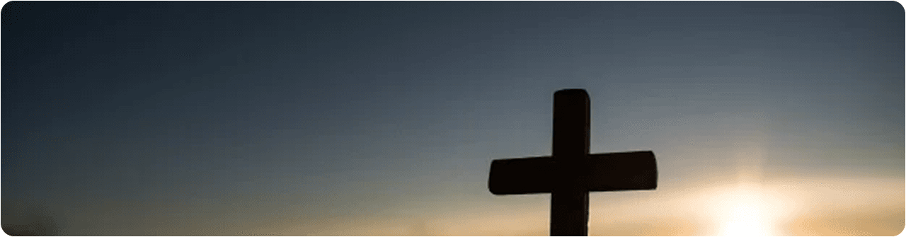 Cruz ao pôr do sol